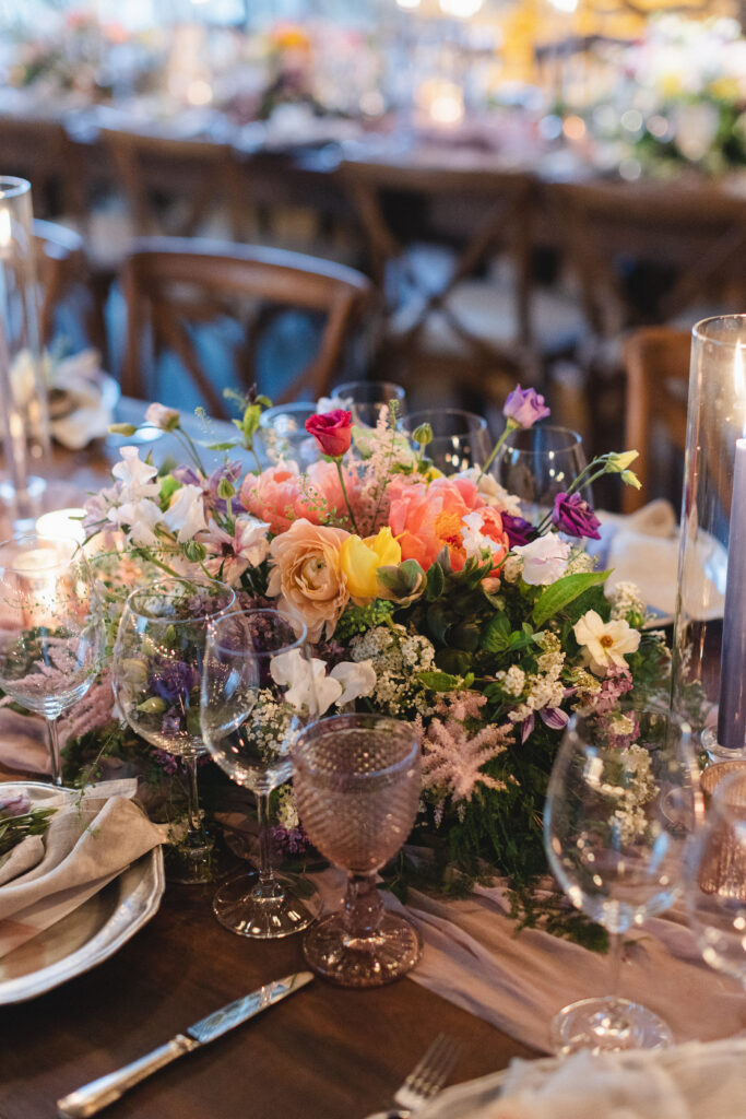 Colorful low centerpieces for spring wedding at Blue Hill at Stone Barns, Long Island NY Florist