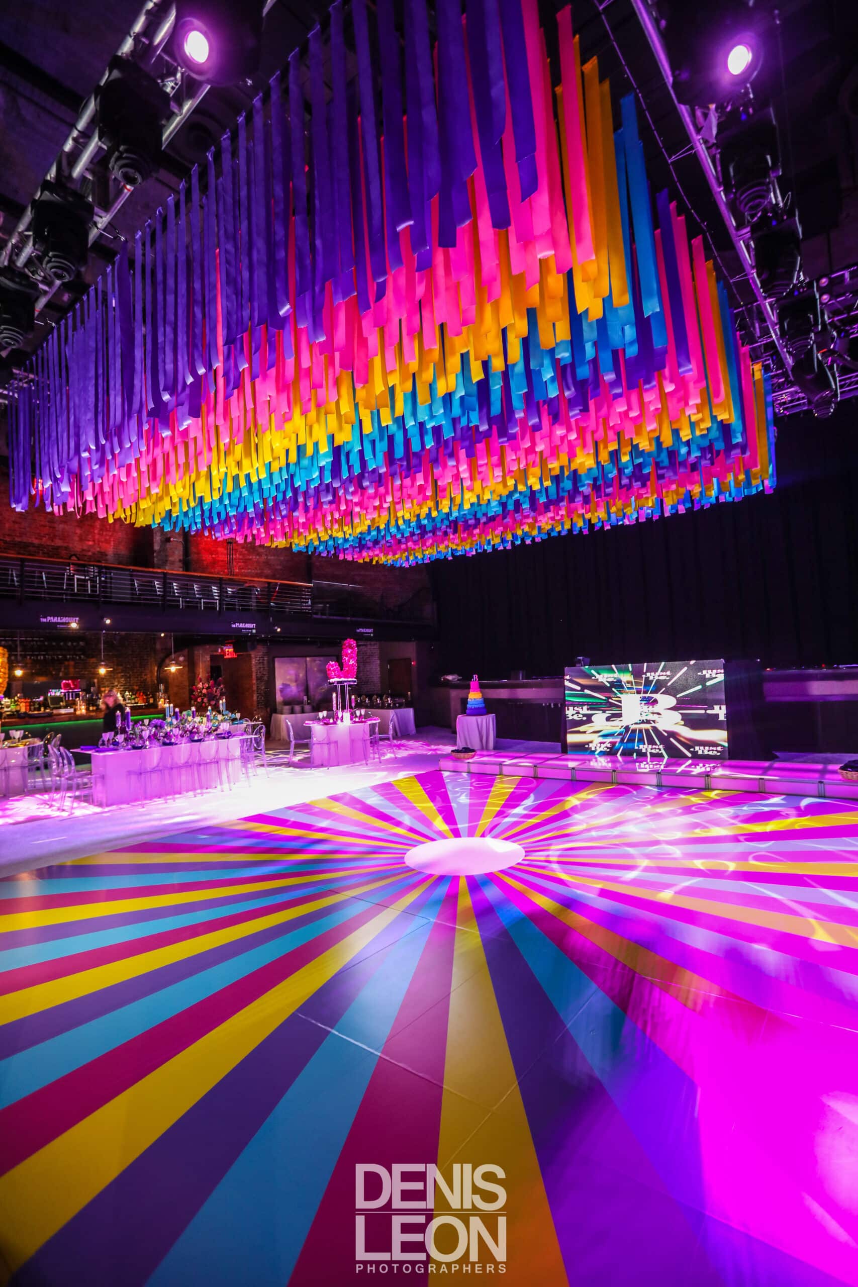 Bat-Mitzvah-Colorful-Theme-Event-Design-Ceiling-Decor-New-York Colorful bat mitzvah ceiling installation of hanging ribbons at The Paramount in Huntington, Long Island NY Florist